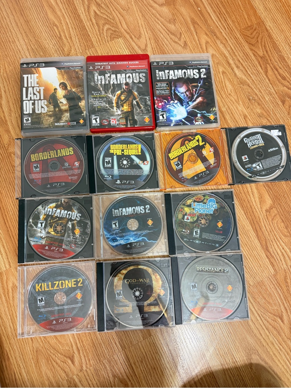 Sony PS3 Game Disc Lot with Colorful Disc Artwork (Black, Red, Yellow, Blue)